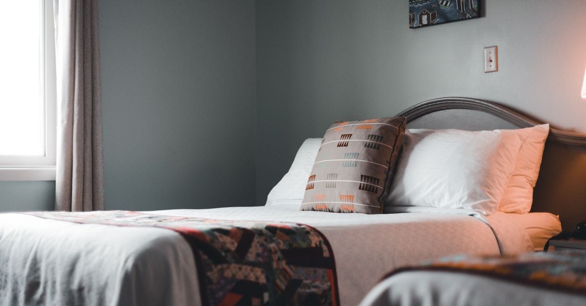A tidy, well-lit hotel room at Shrestha Hotel And Lodge in Gajuri